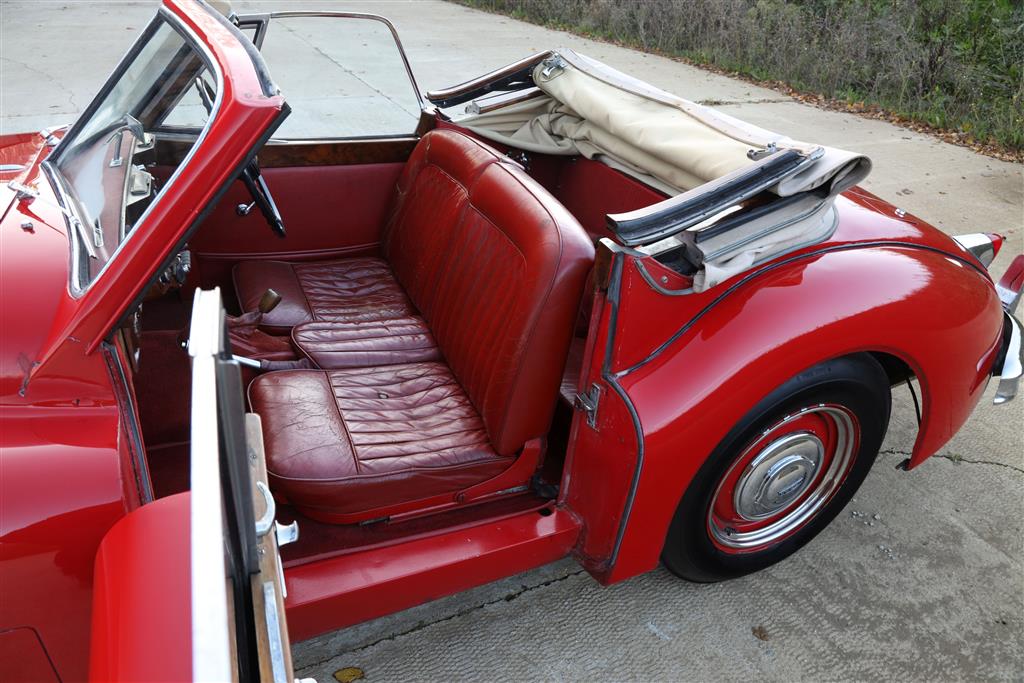 A 1955 Jaguar XK140 DHC